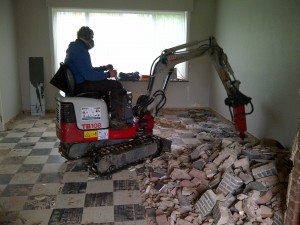 Uitbreken van vloer in huis Torhout
